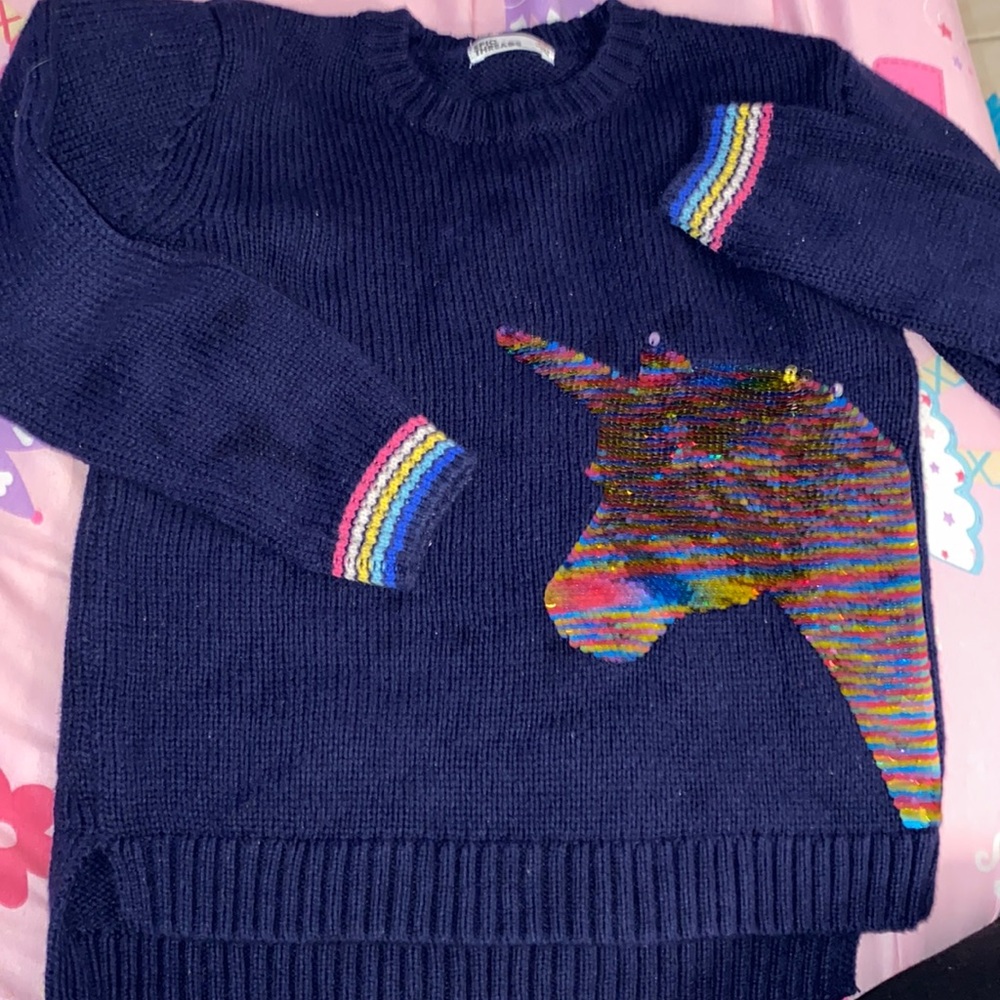 Dark blue child’s sweater